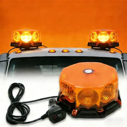 Amber magnetic warning strobe light installed on a truck roof for emergency visibility