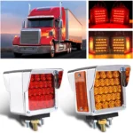 Dual-face red and amber LED fender lights illuminated on a heavy-duty truck