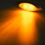 Smoked amber polycarbonate lens side marker light with chrome-plated ABS bezel
