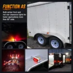 Amber and red chrome fender lights illuminated at night on a semi truck trailer