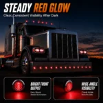Red 3/4 inch chrome LED marker lights installed on a semi truck for steady night visibility and vehicle lighting upgrades